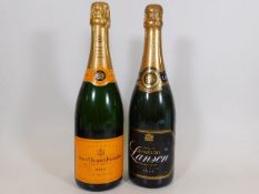 Two bottles of champagne - a bottle of Veuve Clicq