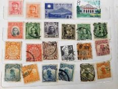A world stamp album including four pages of Chines