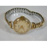 A ladies Smiths Astral watch with 9ct gold case