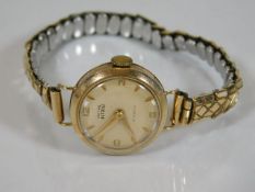 A ladies Smiths Astral watch with 9ct gold case