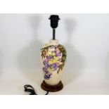 A Moorcroft pottery lamp base approx. 15in of flor