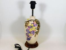 A Moorcroft pottery lamp base approx. 15in of flor