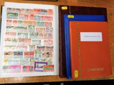 Four well stocked Commonwealth stamp albums