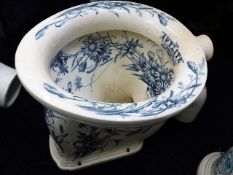 A 19thC. blue & white transferware ceramic toilet The Ivylite, chip to underside of flush rim & some
