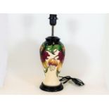 A Moorcroft pottery lamp base Anna Lily by Nicola