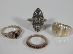 Four vintage silver rings