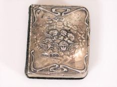 A silver covered miniature bible