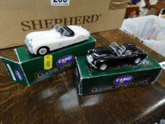 Two boxed Corgi sports cars