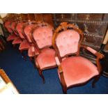 A set of six matching upholstered chairs including