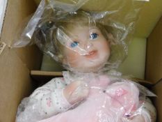 Three boxed Ashton Drake collectable dolls