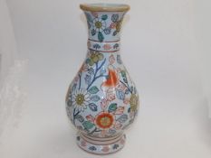 A Chinese porcelain vase with floral decor