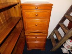 A pair of Stag bedside cabinets each with two draw