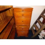 A pair of Stag bedside cabinets each with two draw