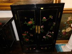 A mid/late 20thC. Oriental lacquerware cabinet