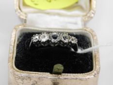 A 9ct gold & silver five stone ring