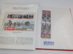 A stamp album twinned with a collection of cigaret