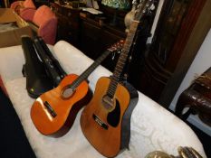 Two modern acoustic guitars