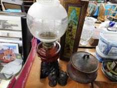 An oil lamp, an ethnic style pot & other items