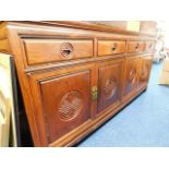 A Chinese rosewood sideboard