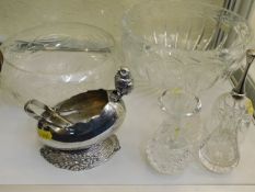 A white metal sugar bowl depicting hatchling as ha