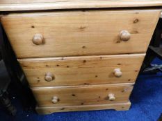 A pine chest of drawers