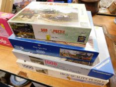 Four railway related jigsaw puzzles