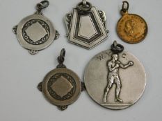 Four silver medals including boxing & one other