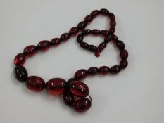 A set of red amber style beads