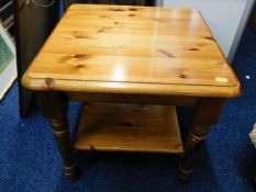 A low level pine lamp table
