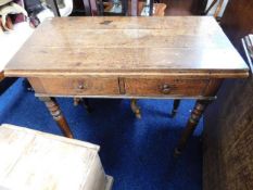 A 19thC. oak games table with two drawers