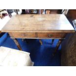 A 19thC. oak games table with two drawers