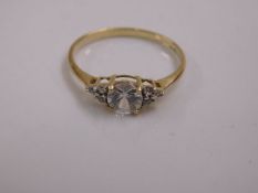 A 9ct gold ladies ring with white stones