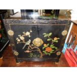 A mid/late 20thC. Oriental lacquerware cabinet