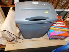 A Filing cabinet with a quantity of household sundry items including a paper shredder, ladies bag, g