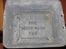 A galvanised steel bath tub The Nesta