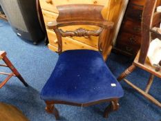 A low level antique bedroom chair