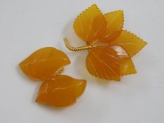 A pair of baltic amber earrings set in Russian mar