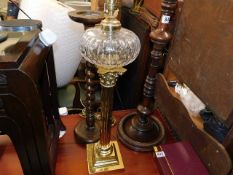 A brass corinthian column electric lamp