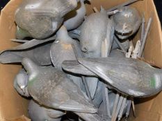 A boxed quantity of pigeon decoys