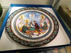 Two decorative Christmas plates by Royal Worcester