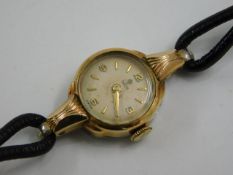 A ladies gold plated Tudor Rolex watch