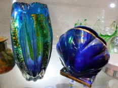 An art glass vase twinned with a lustreware clam