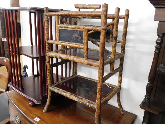 A 1920's Japanese cane & lacquerware shelf unit