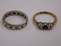 A small 9ct gold sapphire ring twinned with a smal