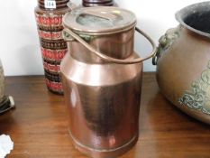 A 19thC. heavy gauge copper milk urn