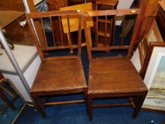 A pair of oak seated farmhouse chairs