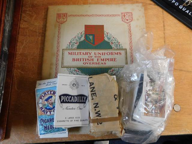 A quantity of vintage cigarette cards including ra