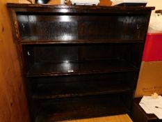 An early 20thC. oak low level bookcase