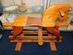 An early 20thC. pine childs rocking horse