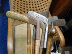 A small election of hickory golf clubs & one walki